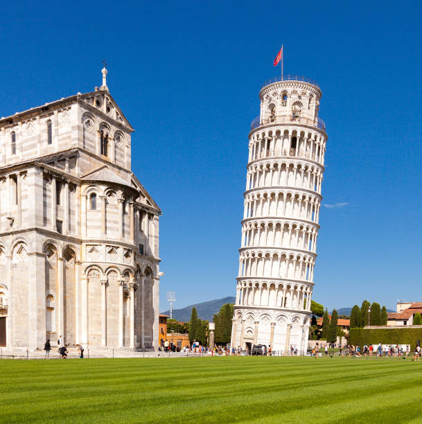 Leaning Tower of Pisa and Pisa Cathedral The Leaning Tower of Pisa, or simply, the Tower of Pisa is the campanile, or freestanding bell tower, of Pisa Cathedral. It is known for its nearly four-degree lean, the result of an unstable foundation. The tower is one of three structures in the Pisa's Cathedral Square, which includes the cathedral and Pisa Baptistry. pisa stock pictures, royalty-free photos & images