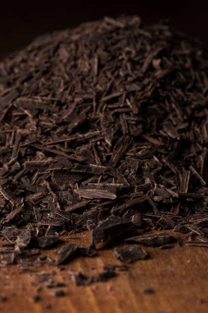 istock Chocolate shredded into pieces. Preparing to make sweets. 1404138658