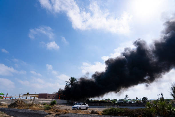 istock Black smoke rising from the fire. 1404140243