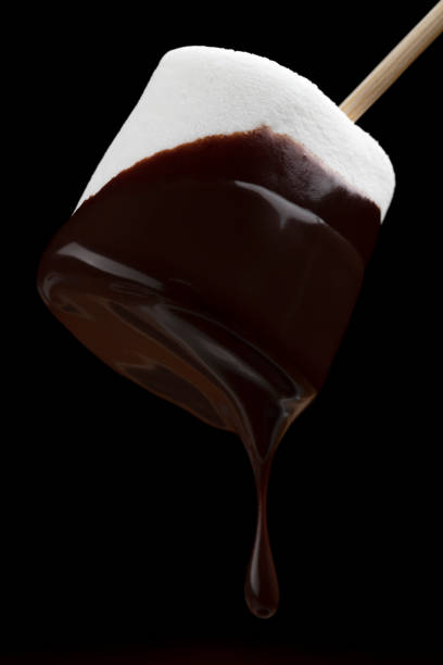 istock Eat with melted chocolate in marshmallows. Chocolate fondue. 1404140421