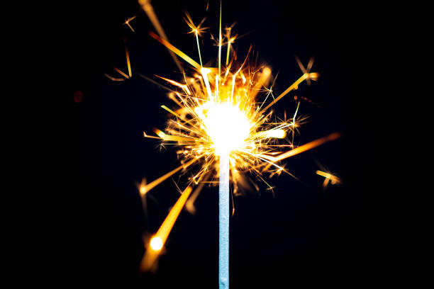 istock Close-Up Sparkler On Black Background 1404148033