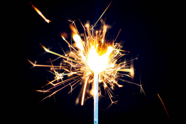 istock Close-Up Sparkler On Black Background 1404149523