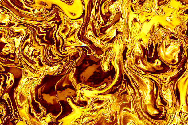 istock multicolor paint spilled onto the canvas, creating an interesting abstract drawing, a pattern of lines, halftones, causing different associations in your design. gold fluid art 1404152713