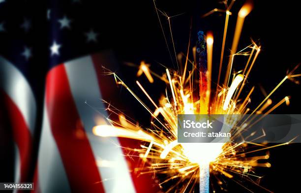 Closeup Sparkler And Usa Flag On Black Background Stock Photo - Download Image Now - Firework - Explosive Material, Firework Display, American Flag