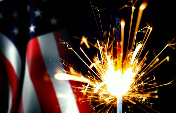 close-up sparkler and usa flag on black background - independence spark fire flame imagens e fotografias de stock