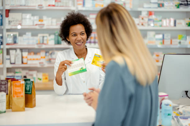 istock Keeping her customer well informed about her medication 1404156961