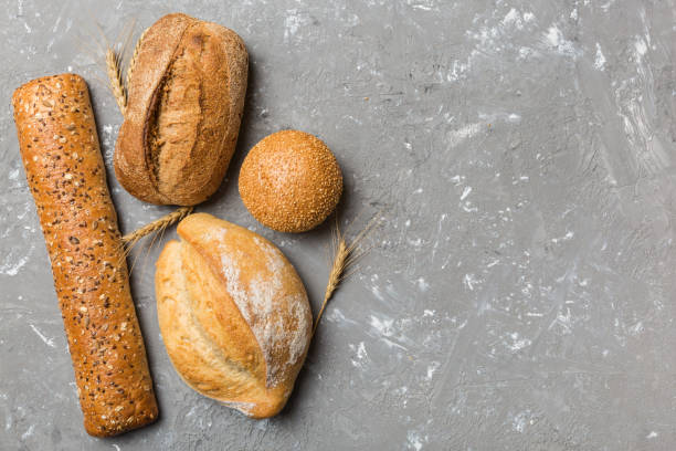 istock Homemade natural breads. Different kinds of fresh bread as background, top view with copy space 1404160210