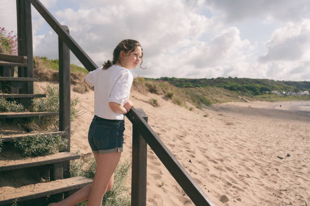 istock Young Girl At The Beach 1404160990