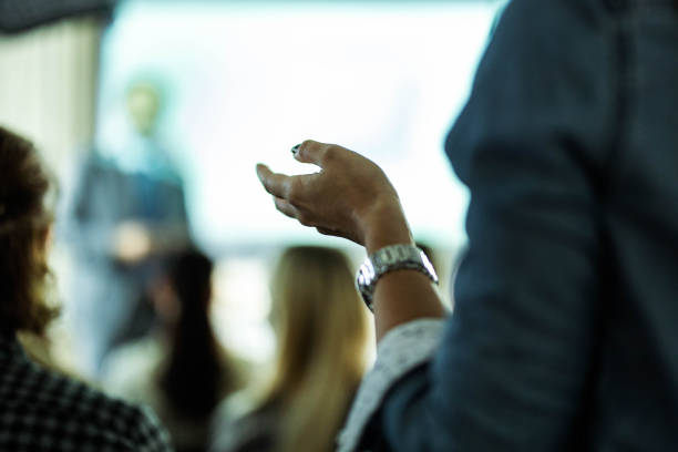 istock Close up of unrecognizable woman talking on a seminar. 1404166889