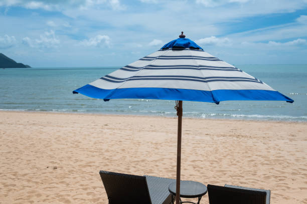 istock beach umbrella, relax time, holiday with family 1404167178