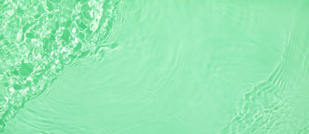 istock banner background transparent green clear water wave surface texture 1404167184