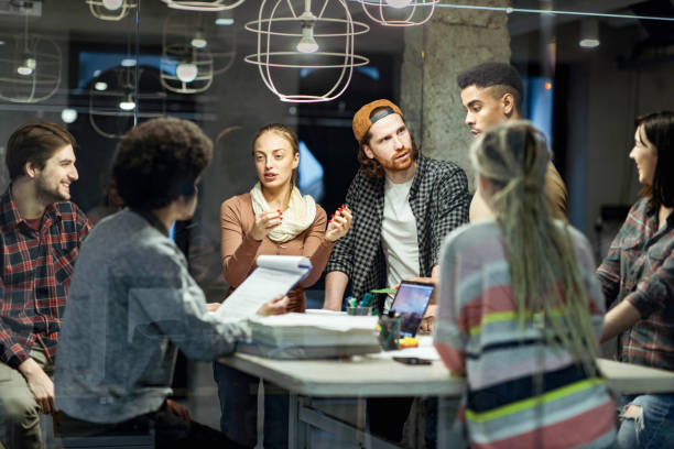 istock Start up team having a casual meeting in the office. 1404167387