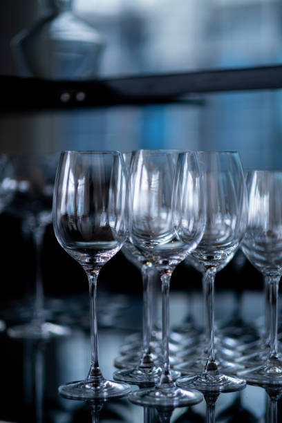 istock champagne glass, celebration, empty glass on the table 1404169918