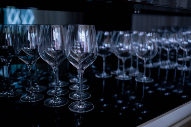 istock champagne glass, celebration, empty glass on the table 1404169920