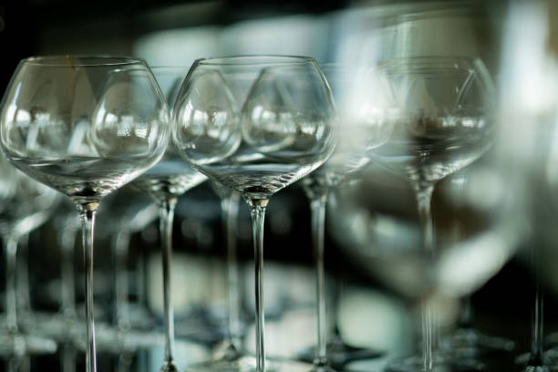 istock champagne glass, celebration, empty glass on the table 1404169921