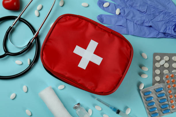 istock First aid medical kit on blue background 1404170025