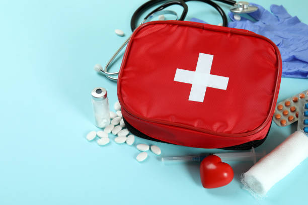 istock First aid medical kit on blue background 1404170069