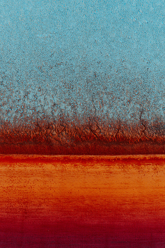 Abstract aerial image of tidal flats and red earth