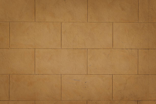 istock Part of an old beige concrete block wall 1404173070