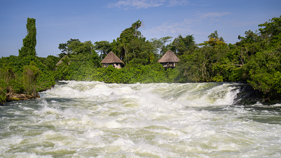 The Itanda Falls of the Victoria Nile in Uganda, sunny day in May