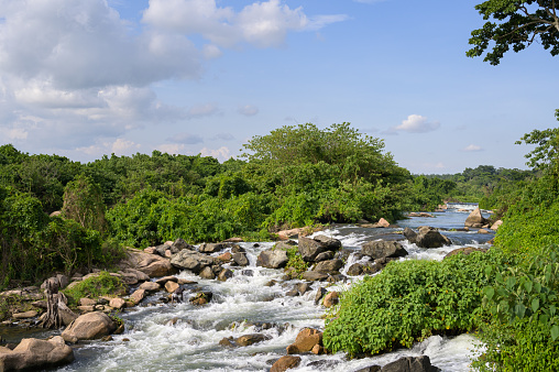 The Itanda Falls of the Victoria Nile in Uganda, sunny day in May