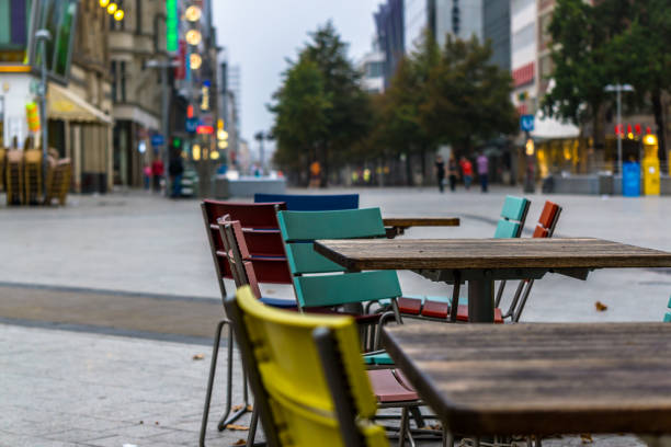 Colored chairs in Cafe at Kröpke Square in Hanover stock photo