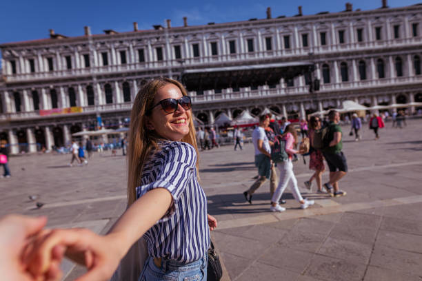 istock Happy lady holding hand of her husband 1404175516