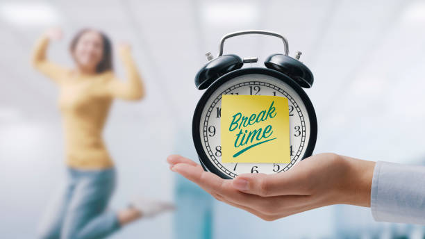istock Happy woman taking a break in the office 1404179441