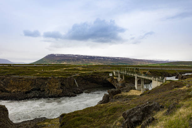 istock Powerful forces of running water under need a bridge 1404181771