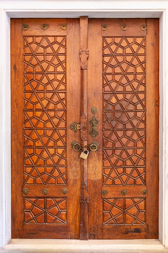 Ornaments on the wooden church doors in armenian medieval monastery Geghard