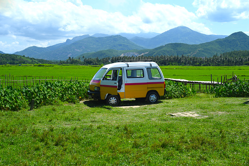 Camper van in sunny valley of Vietnam