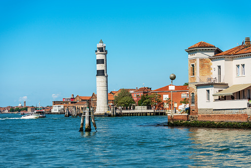 Ancient Lighthouse in Murano Island - Ferry Station in Venice Italy