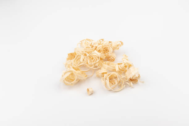 istock Wood chips isolated on light background. Wooden shavings. 1404185965