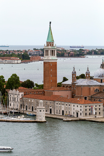 Venice, Italy - 06 09 2022: View of the Church of San Giorgio Maggiore from the St Mark's Campanile in Venice on a summer day.