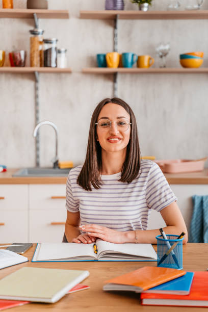 istock Portrait Of Young Female Student Studying 1404193340