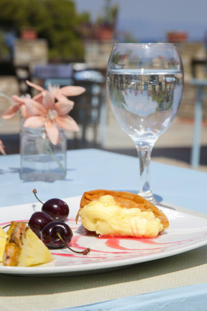 istock Sweet pie served with fruits on the restaurant table 1404193663