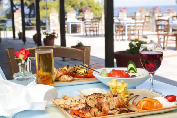 istock Greek dishes served with drinks on the restaurant table 1404193666