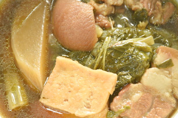 istock boiled mixed vegetable with pork belly and tofu in black soybean soup 1404196172