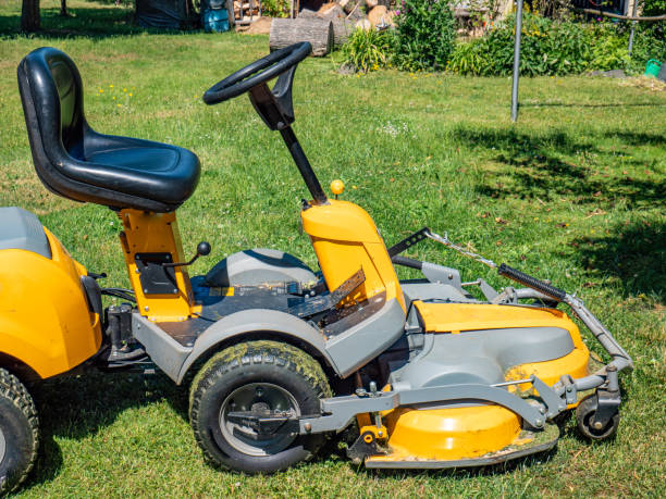 istock lawnmower on grass in the garden 1404196826