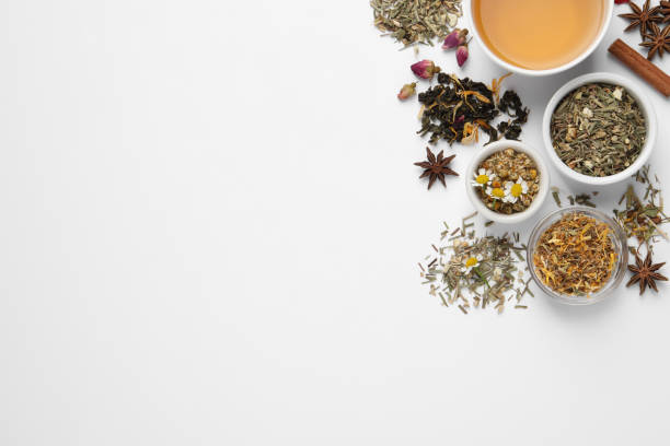 istock Composition with fresh brewed tea and dry leaves on white background, top view 1404197153