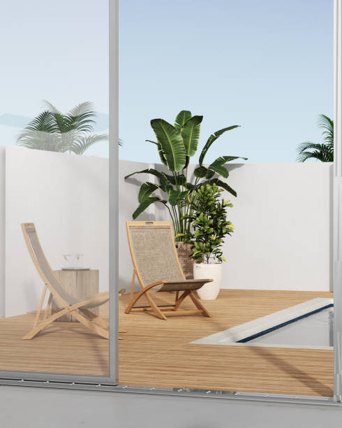 istock Lawn chairs and swimming pool in modern backyard with palm, 3d rendering 1404197257