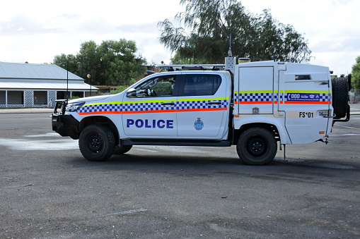 Denham, Wa - Apr 26 2022:Western Australia Police Toyota HiLux police paddy wagon with cage.Police vans are usually employed for prisoners transport or for the rapid transport of a number of officers.