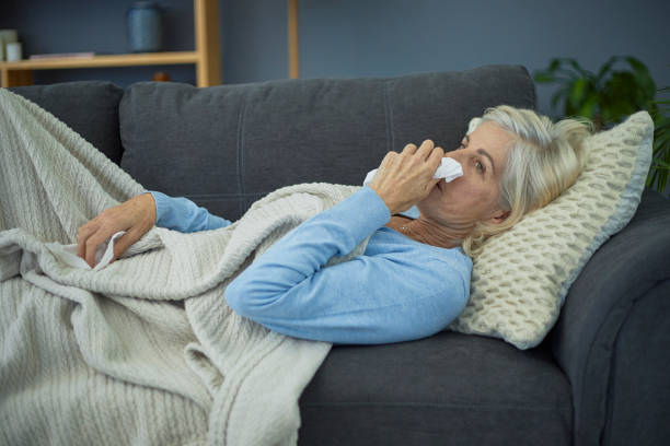 istock Sick woman at home 1404200591