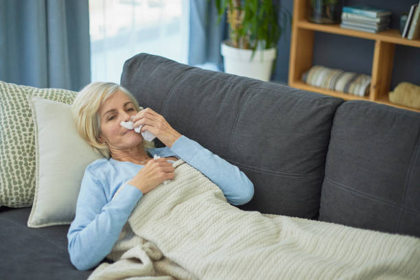 istock Sick woman at home 1404200654