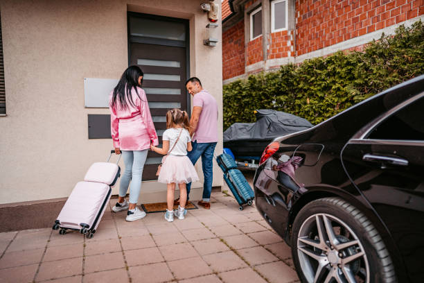 istock Family With Child Arriving In A Hotel 1404200768
