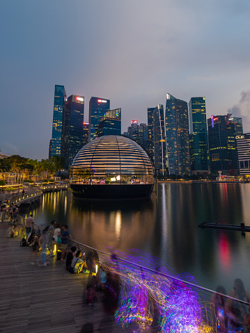 Singapore - May 21, 2022: Apple Island and Singapore downtown skyline at dusk.