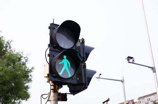 Green traffic lights at crossroads