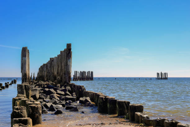 istock Ruins of an old wooden pier 1404208331