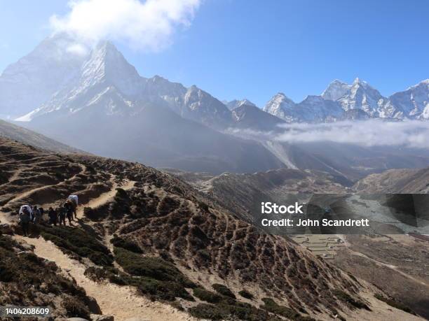 Trekking Away From Dingboche Stock Photo - Download Image Now - Adventure, Ama Dablam, Asia
