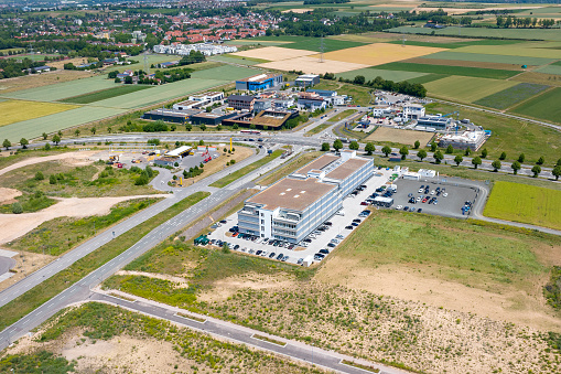 Large industrial buildings and office park. Developing area - aerial view